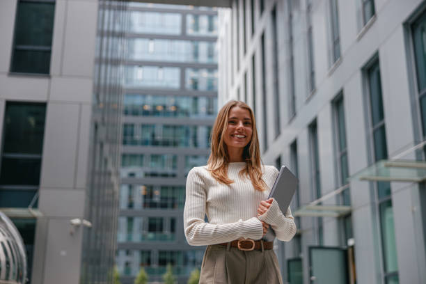 istock A Professional Woman Working in a Contemporary Office Environment with Modern Design Elements 2178837638