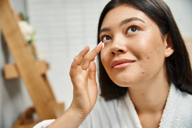 istock A young woman enjoying her evening skincare routine while relaxing at home 2178838805