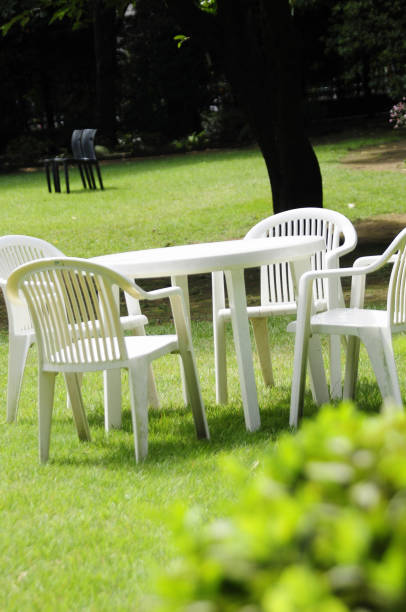 istock White table and chairs in the garden 2178842914