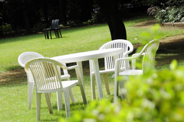 istock White table and chairs in the garden 2178842967
