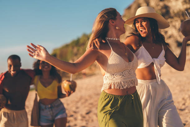 istock Group of young friends having fun at the beach 2178853556