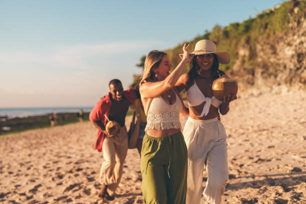 istock Group of young friends having fun at the beach 2178853580