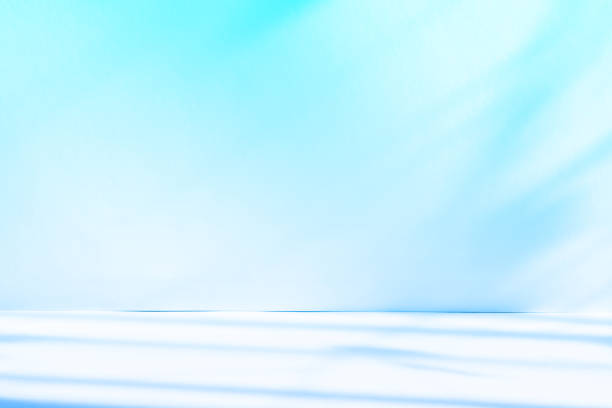 istock Abstract blue color gradient studio background for product presentation. Empty room with shadows of window and flowers and palm leaves . 3d room with copy space. Summer concert. Blurred backdrop. 2178854163