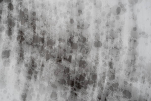 Black ink splashingBlack ink splashing on a dark backgroundBlack ink splashing on a dark background