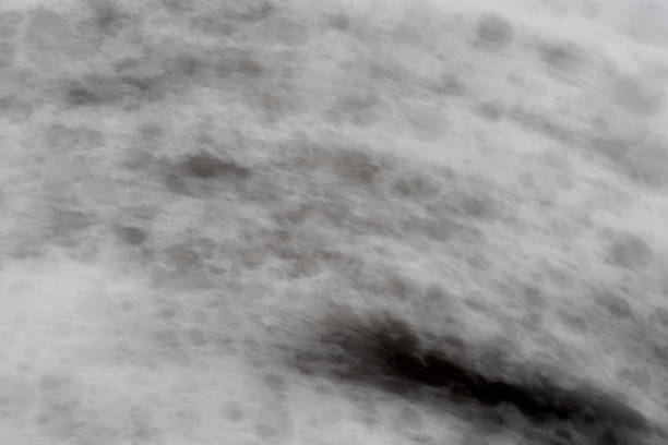 Black ink splashingBlack ink splashing on a dark backgroundBlack ink splashing on a dark background