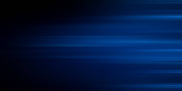 istock Neon blue motion light trails over black background. Abstract speed effect. Rays of light moving fast over dark background 2178858902