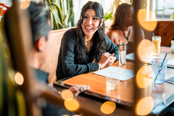 istock Diverse Group Enjoys Social Gathering at Local Bar 2178862264