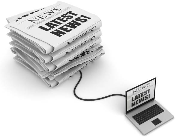 istock Latest news newspaper laptop computer 2178862733