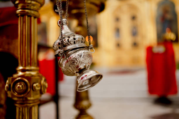 Incense Burns Against Blurred Background Of An Orthodox Church