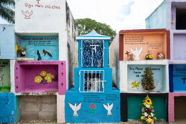 Colorful vertical tombs in the cemetery of the village of Pomuch, southern Mexico, where the bone-cleaning ritual takes place annually, as part of the Day of the Dead celebration.