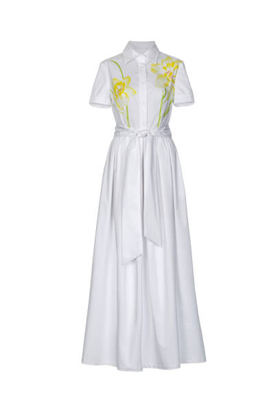 istock A long white  dress with floral design isolated on a white background. 2178875359