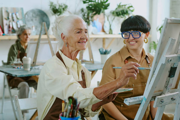 istock Senior Woman Trying to Paint 2178884002