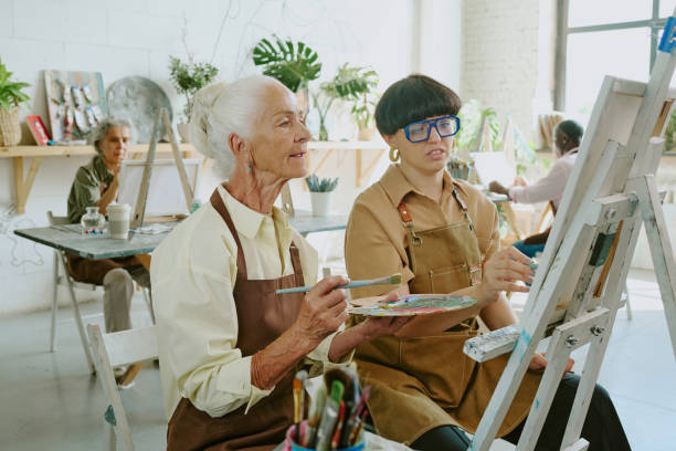 istock Senior Caucasian Woman Visiting Drawing Classes 2178884037