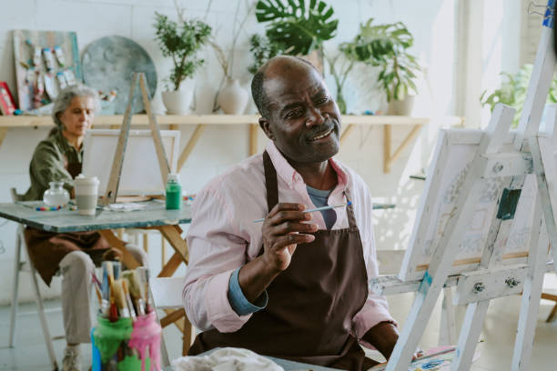 istock Mature Man Enjoying Painting 2178884091