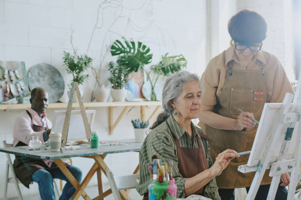 istock Drawing Teacher Cooperating with Senior Student 2178884408