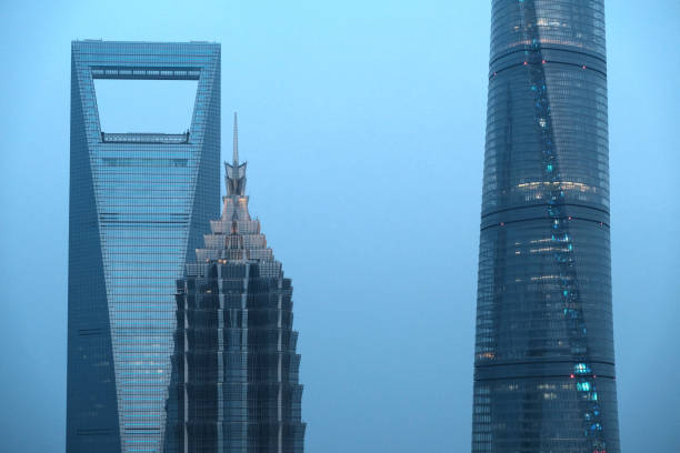 View of the three supertall skyscrapers in Lujiazui Finance and Trade Zone, Shanghai World Financial Center, 492 mt tall, Jin Mao Tower, 420.5 mt and the Shanghai tower, the tallest building in China and the third in the world at 632 mt height.