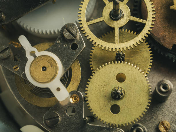 istock Close-up of a mechanical device with gears and teeth, demonstrating the complexity of repairing and assembling a watch movement 2178886828