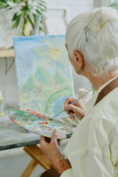 istock Unrecognizable Senior Woman Mixing Paints on Palette 2178886850