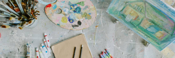 istock Header of Old Table with Paints and Paper 2178888277