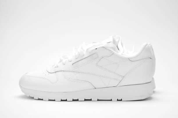 istock New white sneakers on a white background. 2178889226