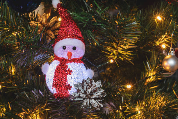 istock Colored Christmas decorations sparkle merrily on the Christmas tree, creating an atmosphere of magic and festive coziness 2178892024