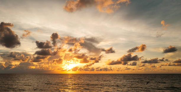 istock Dark storm clouds background. Dramatic dark clouds sky. Dark cloudy tropical sky at sunset sea background. Stormy cloudy sky. 2178892251
