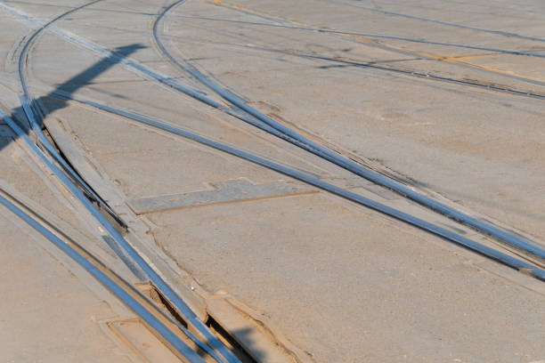 Intersection of tram tracks. City transport. Road traffic.