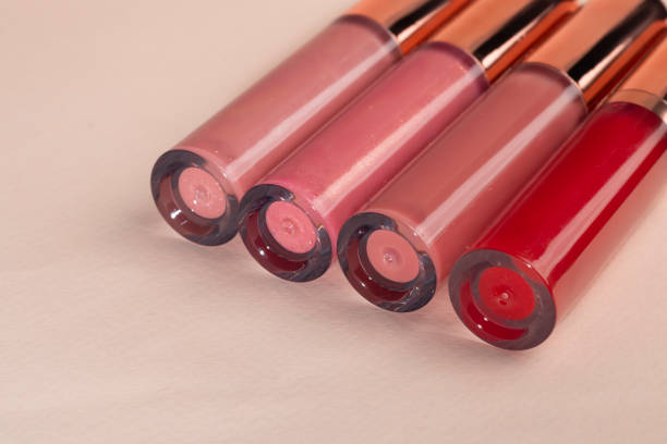 istock Lip gloss with applicator in light tubes. Cosmetic accessories. Copy space 2178896798