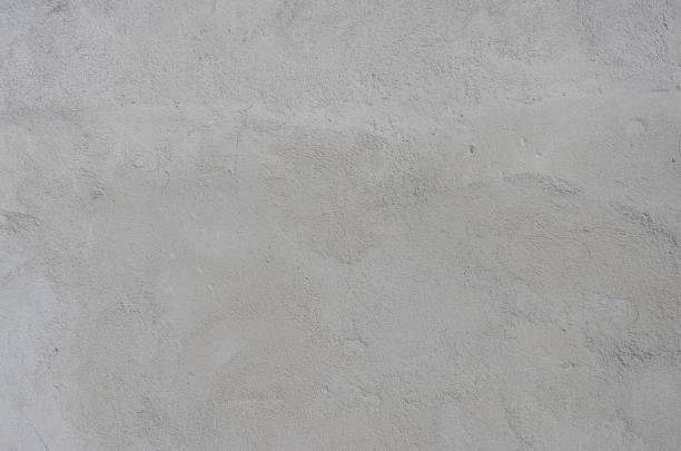 istock Old and weathered concrete wall as background texture. 2178900436