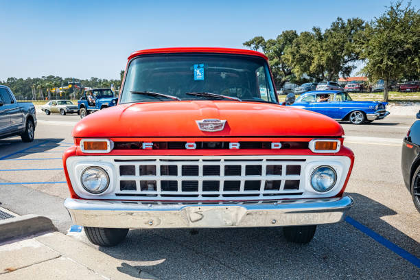 Gulfport, MS - October 03, 2023: High perspective front view of a 1965 Ford F100 Fleetside Pickup Truck at a local car show.