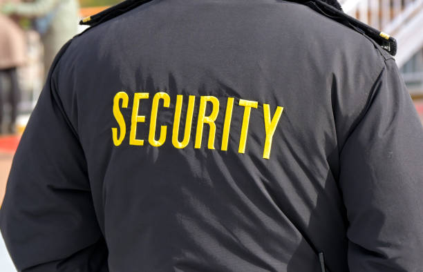 istock Rear view of the jacket of a security guard 2178902707