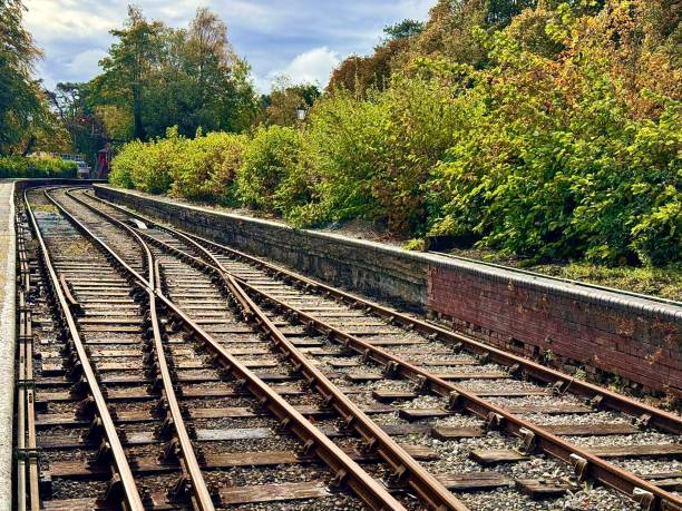 istock Empty tree lined railway tracks in the Lake District National Park 2178910670