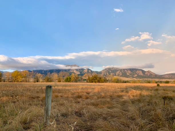 istock Mountains Beneath a Blue Sky and Clouds from a Hiking Trail 2178911166