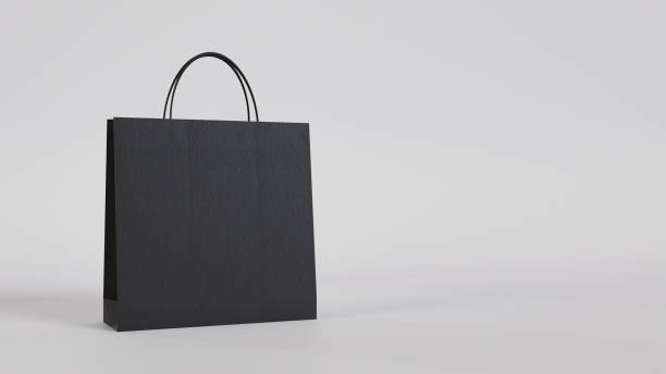 istock Black shopping bag on a minimalist white background 2178912801