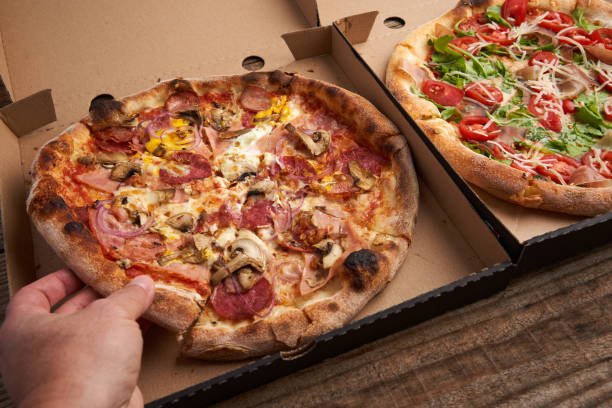 istock Whole pizza in a cardboard 2178914885
