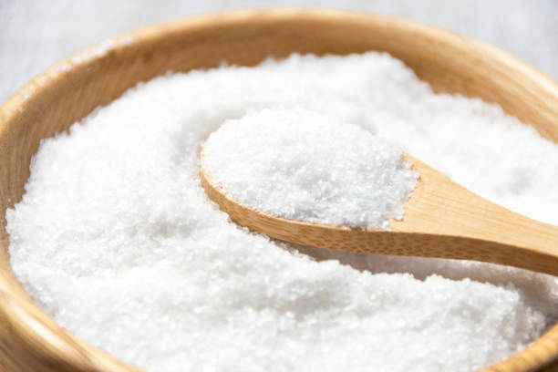 istock Salt in a wooden spoon close-up. 2178924130
