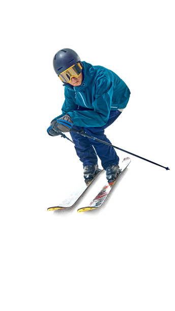 istock Skier carves through snow with dynamic movement, dressed in full gear, prepared for any slope against white studio background. 2178930173