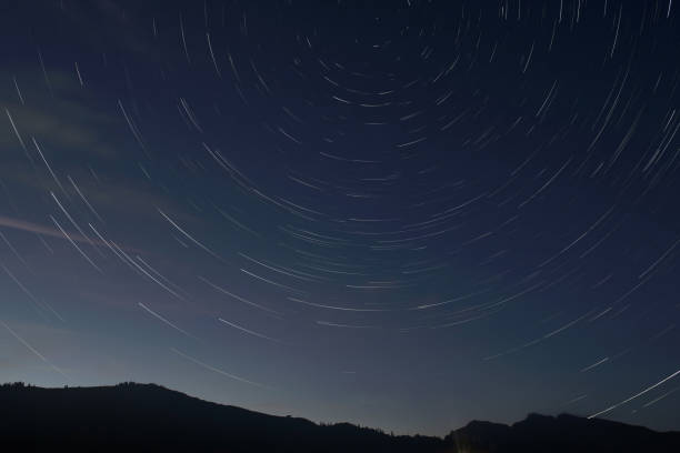 istock Nocturnal Mountainscape With Star Trails 2178930848