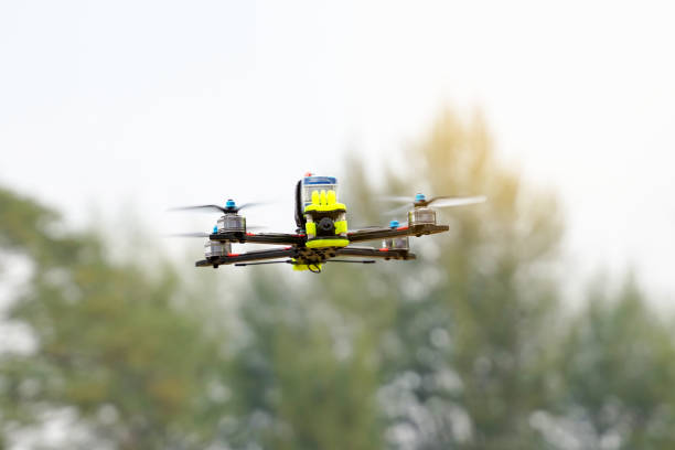 istock Asian high school students demonstrate flying drones or multirotor unmanned aerial vehicle technology. soft and selective focus. 2178933187