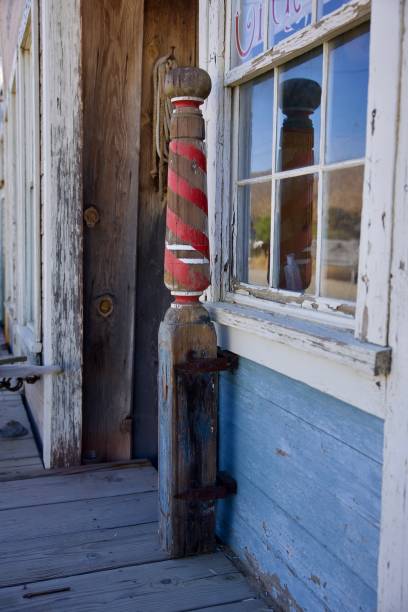 istock Ghost town barber shop striped pole 2178943584