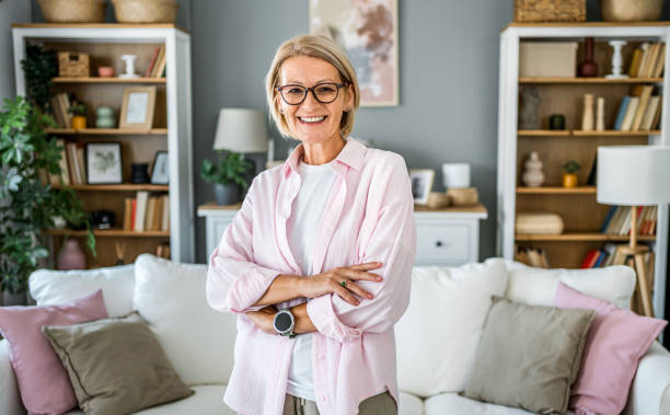 istock Smiling mature woman at home 2178944490