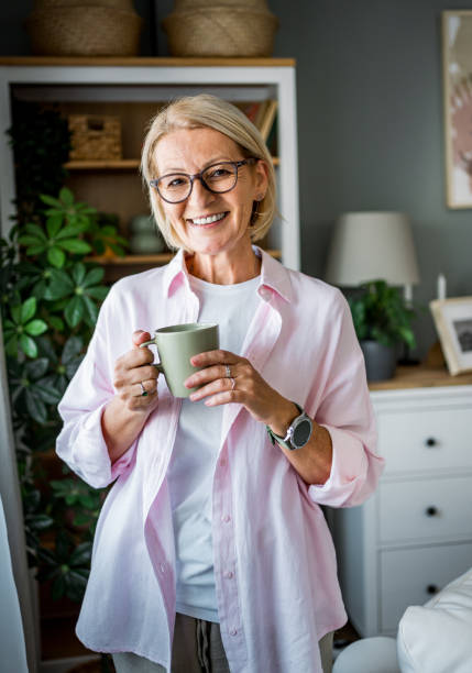 istock Woman with coffee at home 2178946223