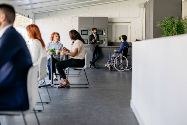 istock Multiracial business people having lunch break in company cafeteria 2178951163