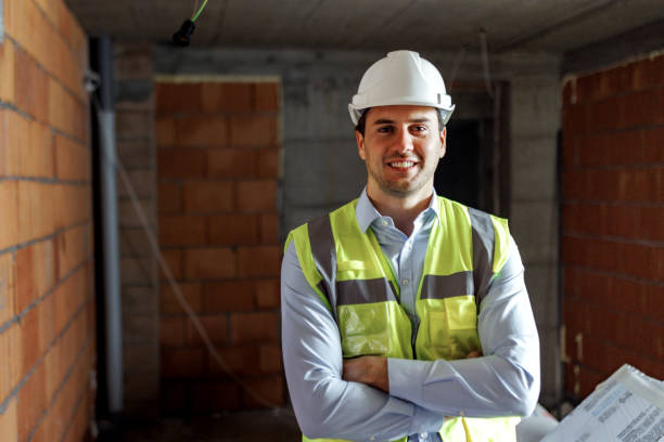 istock Portrait of young handsome male architect on construction site 2178953070