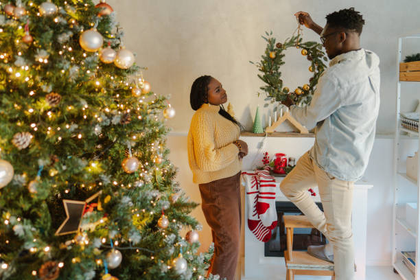 istock Couple decorating for Christmas Holidays 2178953269
