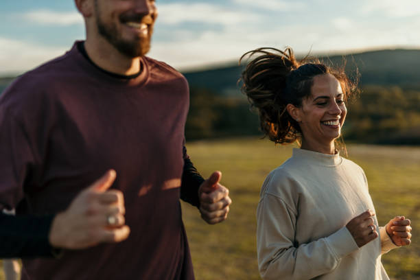 istock Couple jog on sunset 2178957924