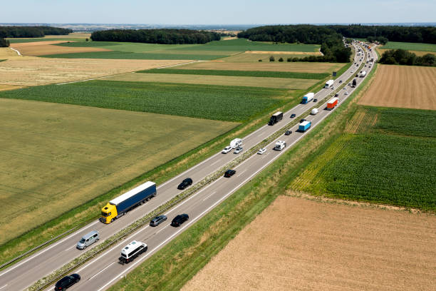 istock Traffic on highway in summer landscape 2178962529