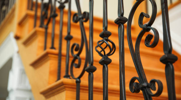 istock Close-up view of a metal fence with interlocking bars, symbolizing security, boundaries, and division. It represents protection, restriction, and the fine line between freedom and confinement 2178962905