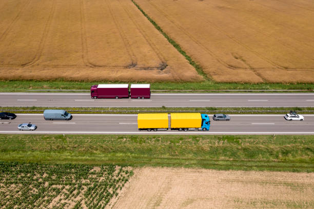 istock Traffic on a highway in summer landscape 2178967909