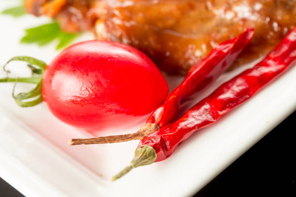 Braised duck wings, Chinese cuisine.